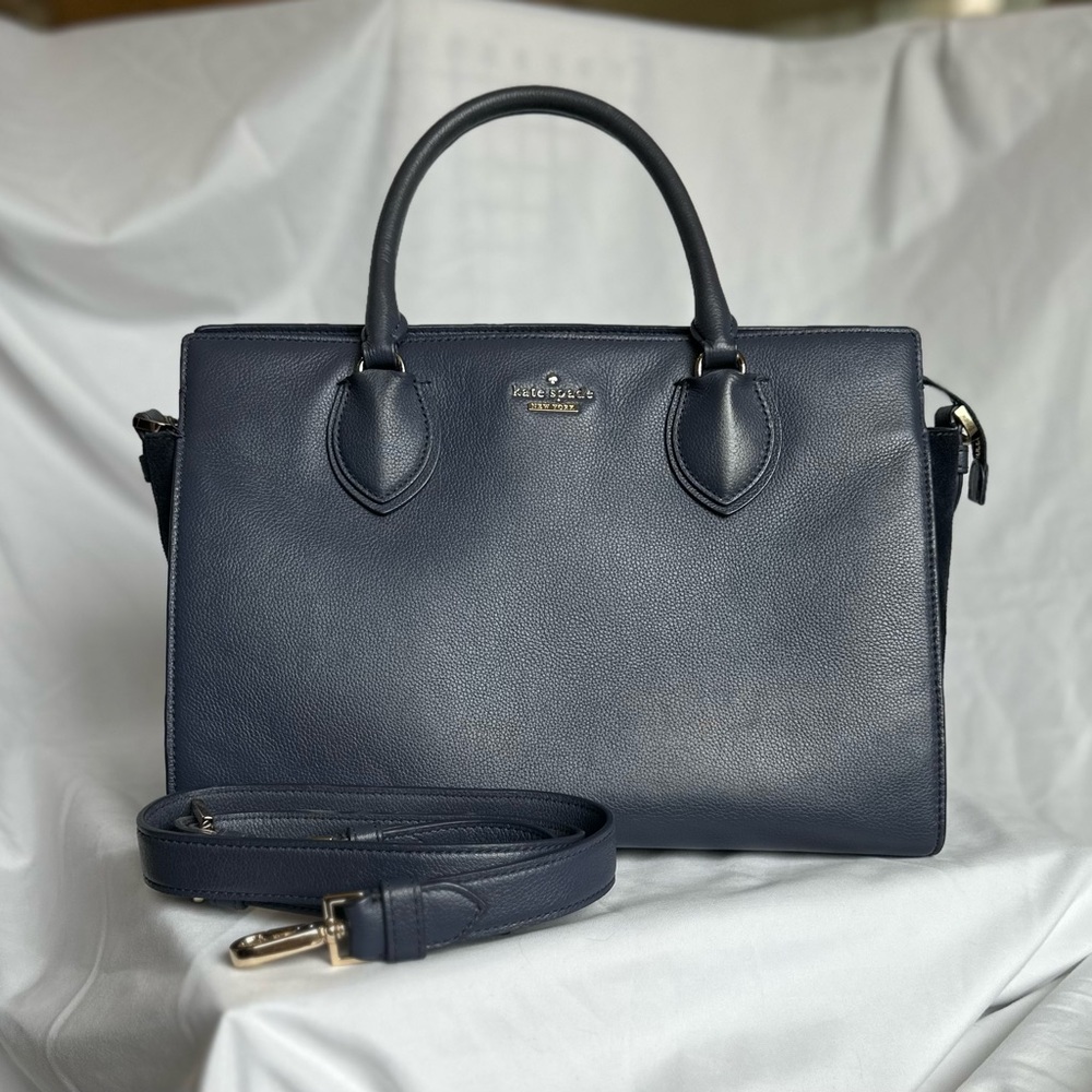 Genuine leather satchel/shoulder/crossbody bag. Center divided zipper pocket.